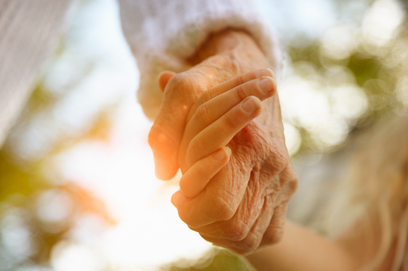 Holding hand to old people