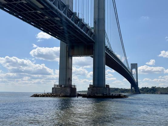 Under the Verrazano Bridge on a sunny day.