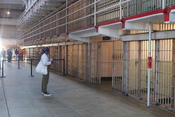 Woman on a tour of Alcatraz Federal Penitentiary
