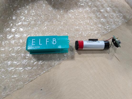 This is the electronics part. Contains the charging and powers the wicks. It had a 650mAh battery