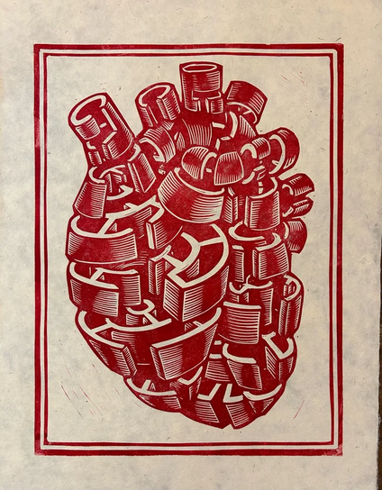une petite gravure d'un coeur imprimé à l'encre rouge, composé de tranches de labyrinthe
