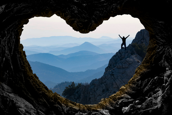 Man inside a shaped heart mountain