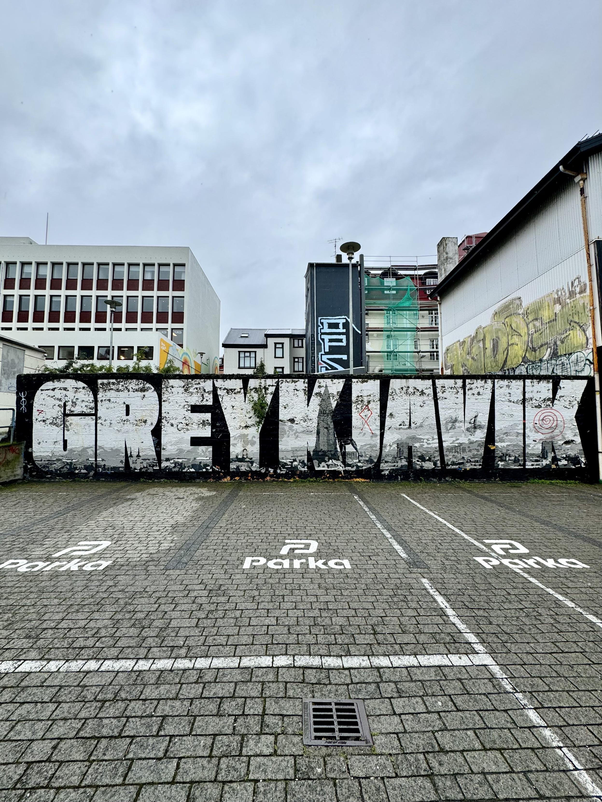 My favorite Reykjavík street art, a wall with the word GREYKJAVIK on it and the city scape painted in the letters