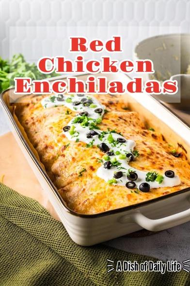Casserole dish full of baked Chicken Enchiladas with red sauce. Topped with sour cream, green onions, cilantro and black olives. 

Text overlay on photo says: Red Chicken Enchiladas