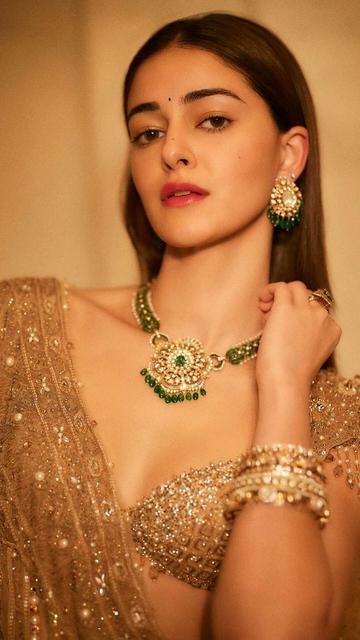 Celebrate Ganesh Chaturthi in style by drawing inspiration from Ananya Panday’s flawless desi look. The actress adorns a royal traditional outfit that radiates both elegance and grace, perfect for the festive occasion. Her choice of accessories and the way she carries herself exudes sophistication. If you’re looking to elevate your festive wardrobe, Ananya’s stunning ensemble is the ultimate fashion inspiration for all festive lovers.