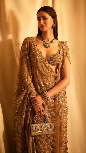 Ananya Panday embraces traditional charm in a royal desi outfit for Ganesh Chaturthi. Her attire reflects a rich cultural heritage while being effortlessly chic, showcasing the perfect harmony between the old and the new. This elegant look is ideal for those seeking Ganesh Chaturthi fashion inspiration that balances modernity with tradition. Ananya sets the bar high for festive fashion this season.