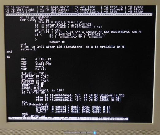 A monitor screen displaying the Wordstar-compatible NOE editor with a T3X program loaded, some help information at the top of the screen and information about compiled program size in the bottom line.