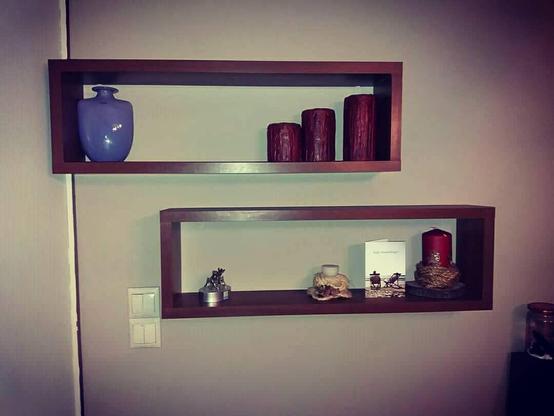 Wall design shelves with vase, ceriums and various handmade objects pieces photographed by me Theodoros Mpahoumas