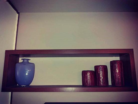Wall design shelves with vase, ceriums and various handmade objects pieces photographed by me Theodoros Mpahoumas