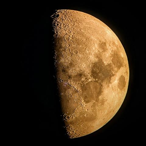 The moon tinted redish due to atmospheric haze Wednesday 11 Sep, taken with the small Bushnell telescope at Allan I Carswell Observatory atrium during the public tour 
 Image credit: AICO, Cassia Bond