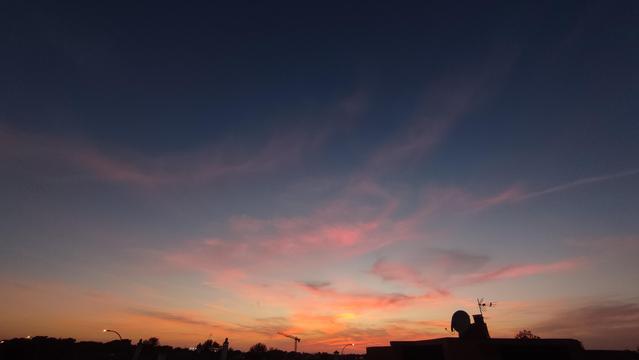 Wide angle (0.6x) landscape photo if this sunset