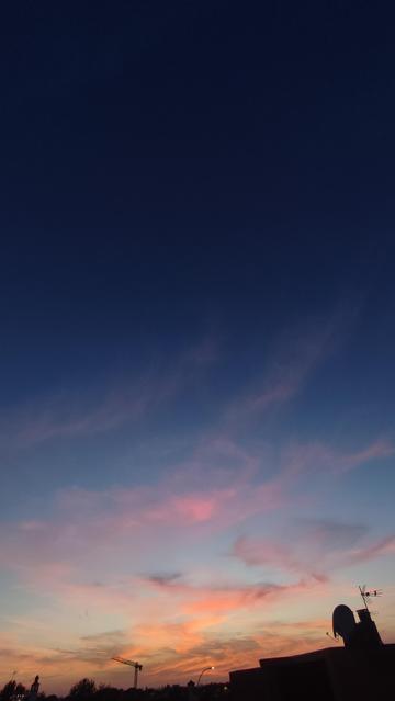 Wide angle (0.6x) portrait photo if this sunset
