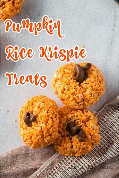 3 rice krispie pumpkins with tootsie roll stems bunched up on counter.  Text overlay says Pumpkin Rice Krispie Treats.

