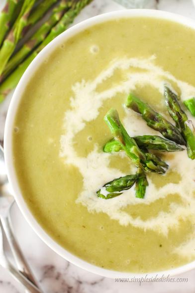 zoomed in of finished asparagus soup and a drizzle of half and half on top. 