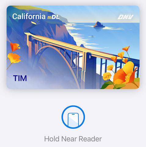 California mobile drivers license within Apple Wallet. Showing an illustration of the Big Sur bridge with orange poppies, the California state flower, in the foreground.
Beneath the card it says “Hold Near Reader”.