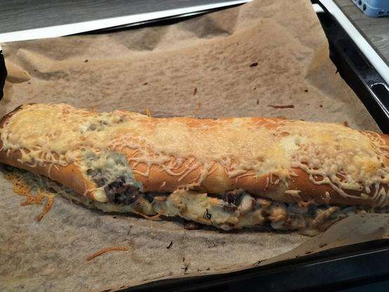 Omelet roll with cheese topping 