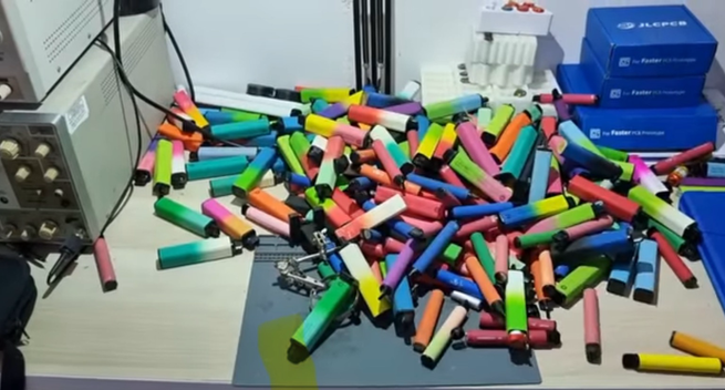 Disposable Vapes on desk to create a Powerbank 