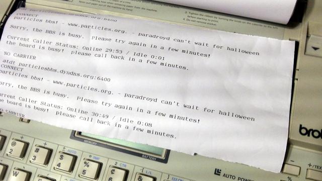 Using a USB-to-Serial cable, a null modem, a 9-to-25-pin adapter, tcpser running on Linux, and a Brother EP-44 thermal typewriter to connect to a telnet BBS at 110 baud