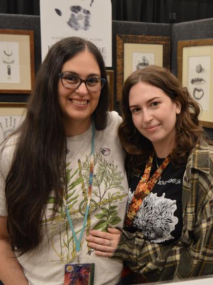 My daughter and I behind my booth