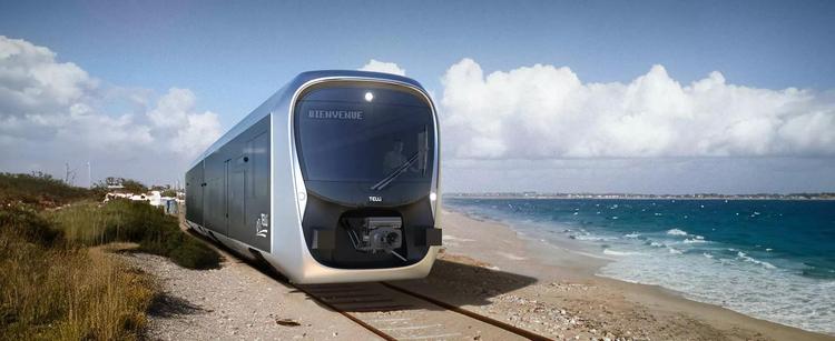 A photo of a concept train form SNFC called TELLi BEMU running on very sandy rails very close to sea water.