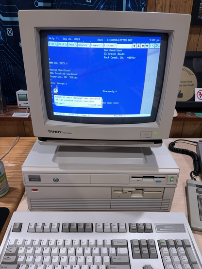 Tandy 3000 NL running the DeskMate tutorial program for the Text application.