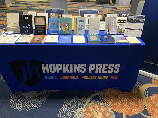 A display of books and journals on the Hopkins Press table at the German Studies Association conference exhibition room 