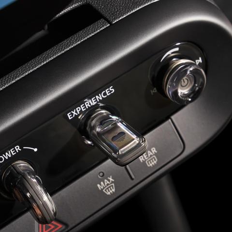 A newer BMW Mini has physical controls on the dashboard. BMW GROUP