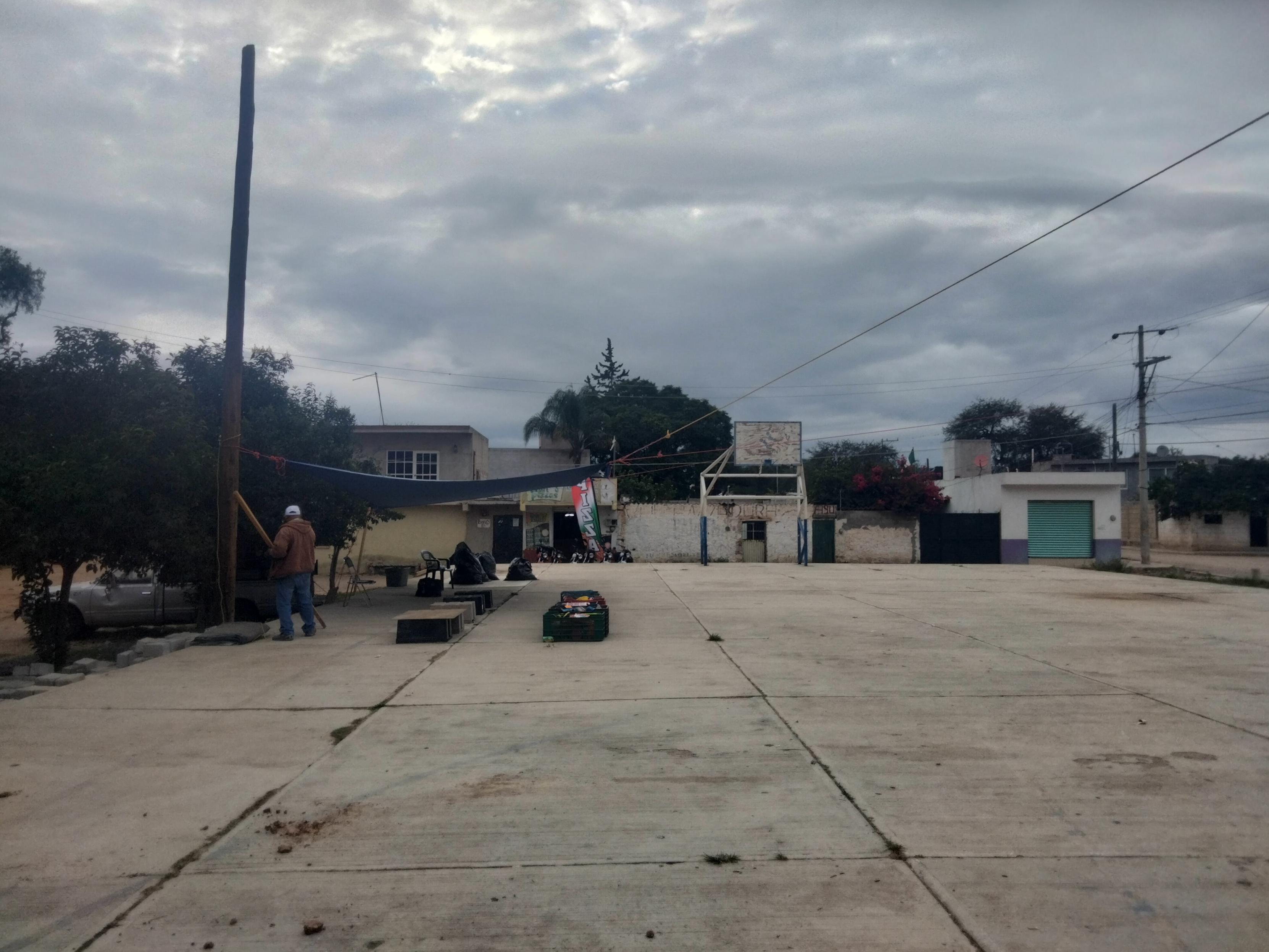 Square in a local community nearby a data centre. UN+Microsoft promised 1M Mexican dollars-infrastructure to have a shadow here. People wondered where is the money.