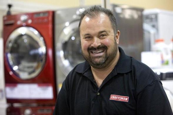 Frank Fritz of the TV series, ‘American Pickers’ in a black polo shirt. 