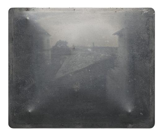 The earliest saved photographic image (Heliograph on pewter plate), taken sometime between 1822 and 1827 by Joseph Nicéphore Niépce, taken at Le Gras, France.