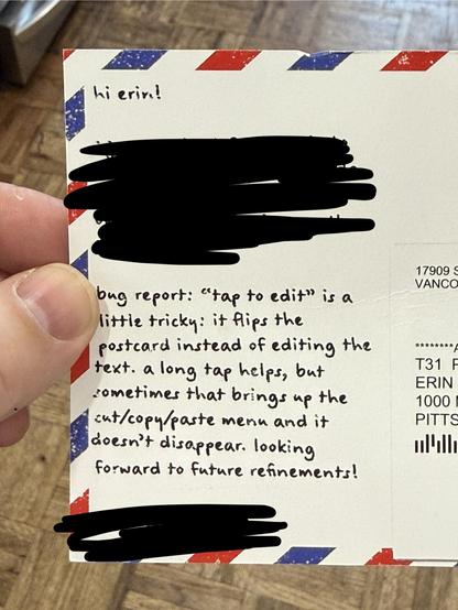 A redacted postcard that contains a bug report on a UI element flipping over incorrectly. 