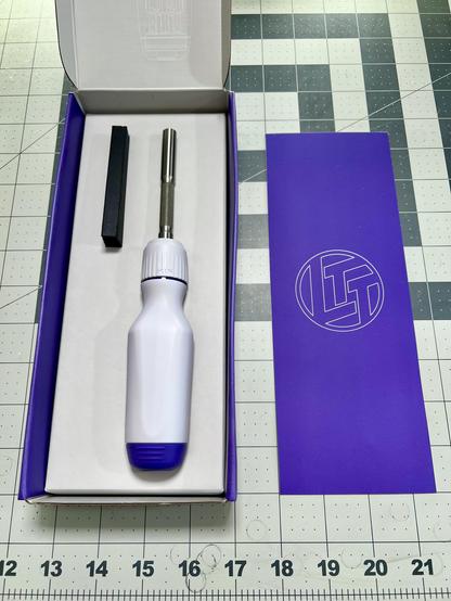 The retro LTT Screwdriver from Linus Tech Tips.  It’s white and purple, similar to the SNES console.
