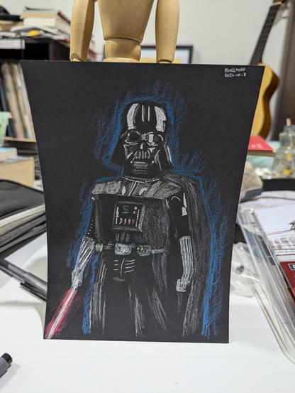 Darth Vader drawn with white ink, white chalk, and pastel on a black piece of paper