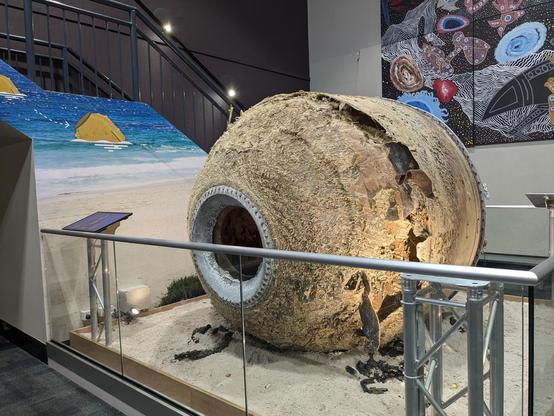 Solid motor casing of spent stage from an Indian rocket displayed at Scitech, Perth