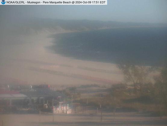 Wide view of Pere Marquette Beach in Muskegon with a beach house in the foreground. // Image captured at: 2024-10-09 21:51:01 UTC (about 12 min. prior to this post) // Current Temp in Muskegon: 58.51 F | 14.73 C // Precip: clear sky // Wind: NNW at 8.008 mph | 12.88 kph // Humidity: 58%