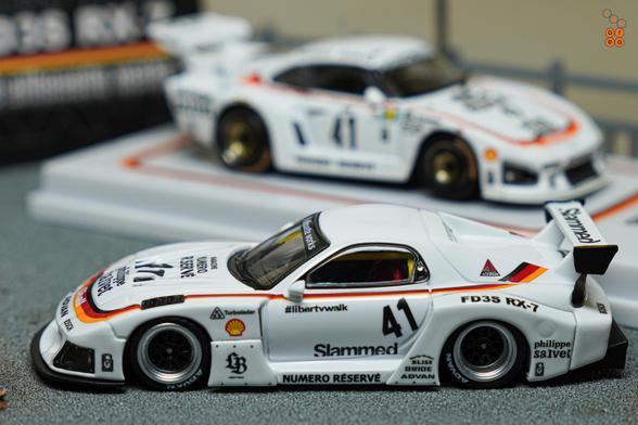 A focus shot on Mazda RX-7 FD3S, LB-Super Silhouette, Numero Réservé livery by iNNO64 in 1:64 scale on AREA 164
