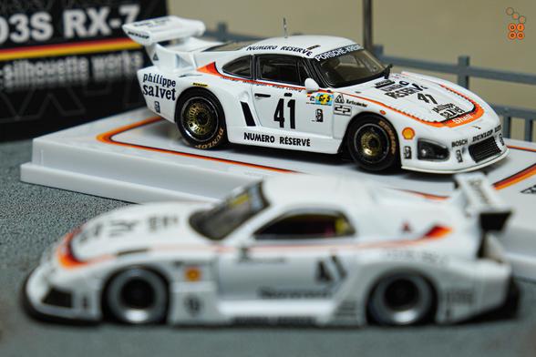 A focus shot on Porsche 935 K3, Numero Réservé livery by Tarmac Works in 1:64 scale on AREA 164