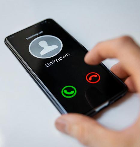 smartphone with incoming call from unknown person