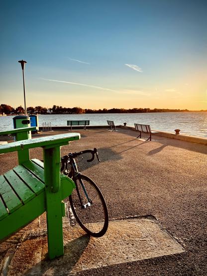 Giant chair with my bike a dock over Saint Lauren river 