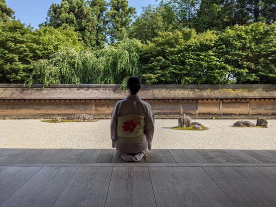 It is thought that the famous dry landscape garden at Ryoan-ji originally made use of borrowed scenery, but over time trees grew and obscured the view.