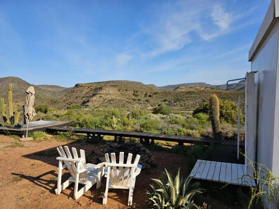 Hot tub on the left and outdoor shower on the right