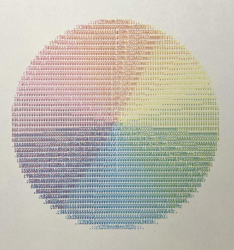 A linear color wheel printed as ASCII text on a CMYK dot matrix printer. 