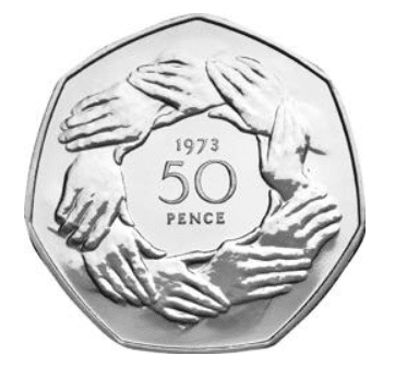 A UK 7-sided silver coin worth 50 pence. A circle 9 8 overlapping hands is featured on the side show and inside the ring of hands are the date; 1973 (small, top), and 50 (large) and pence below that (small)