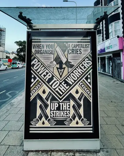 When you Organise 
A Capitalist Cries

POWER TO THE WORKERS
UP THE STRIKES 

Art illustration by Frank Riot poster size put into a bus shelter “advertising” space (behind glass) on a suburban street. 

https://www.frankriot.co.uk/about-3
