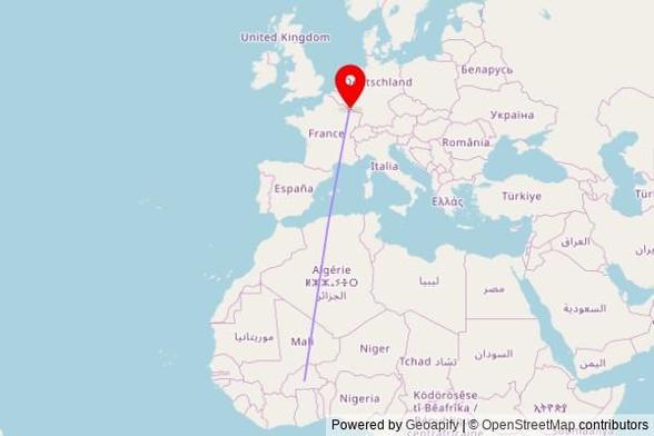 A map showing the great circle route from Ouagadougou in Burkina Faso to a map pin at Saints-Pierre-et-Paul, 31A Rue de l'Église, 4552 Differdange, Luxembourg