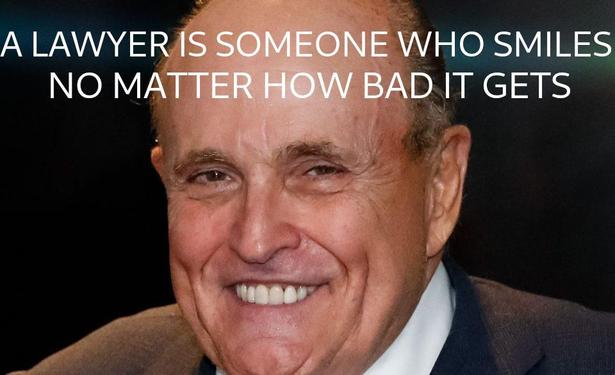 A picture of Rudy Giuliani smiling with a quote from the first Phoenix Wright Ace Attorney Game that says, "A lawyer is someone who smiles no matter how bad it gets."