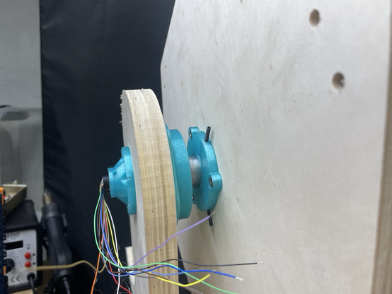 Showing off the 3D printed parts - a slip-ring holder, the bearing holder, and the shaft holder