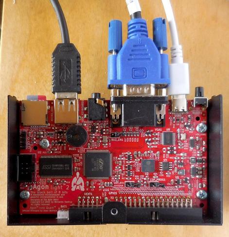 An Agon Light 2 single board computer with a USB2, VGA, and USB3 connector attached