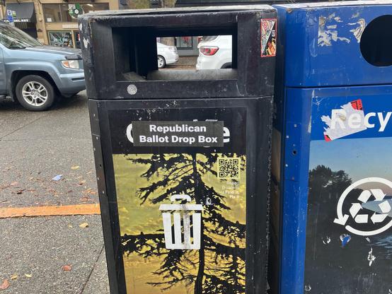 A public garbage can on Broadway in Seattle with a bumper sticker that reads, “Republican Drop Box."