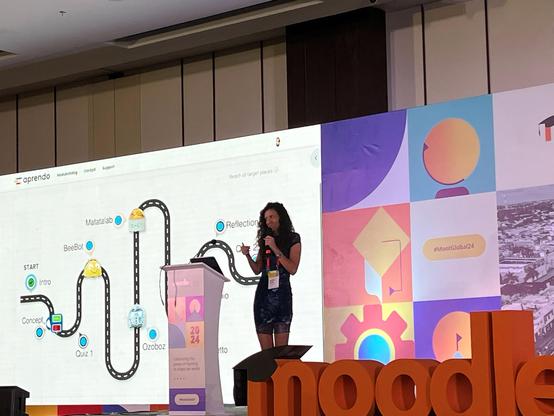 Judith Birke presenting learning map on ground robotics at Moodle MootGlobal24